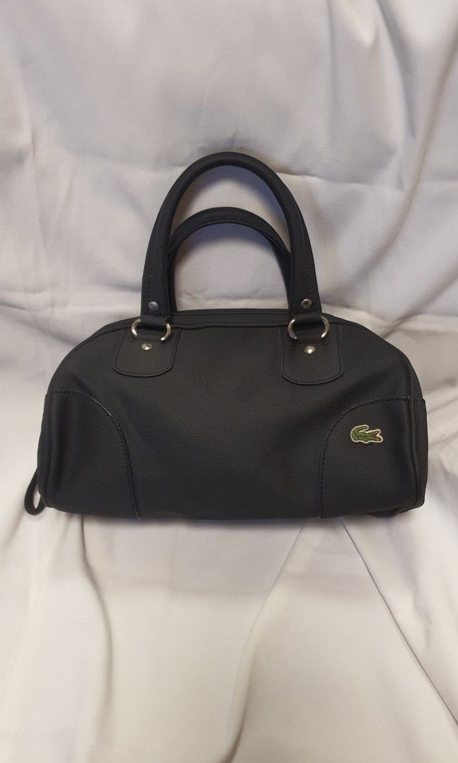 Lacoste Black Bag (Category: Luxury Bags & Wallets) located in Pasig City. Submitted by angel025 (Listing ID 1464125798, Image 1). Description: .