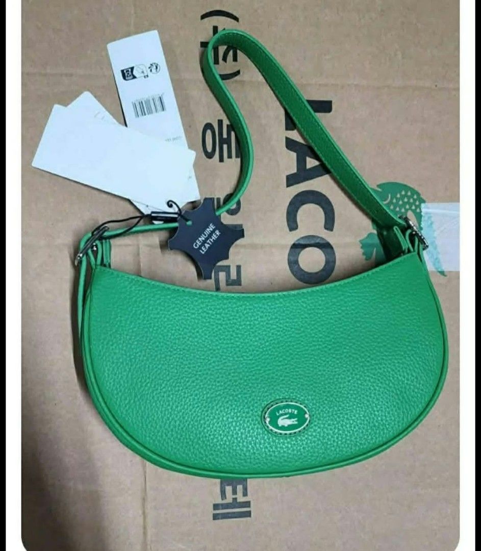 Lacoste Green Leather Crescent Shoulder Bag (Category: Shoulder Bags) located in Quezon City. Submitted by elihur.tuazon (Listing ID 1464069922, Image 1). Description: Used ONCE - Brand new condition Legit/Authentic Selling for 4.5k Green Leather Lacoste Shoulder Bag (cresent, baguette, or mini hobo bag).