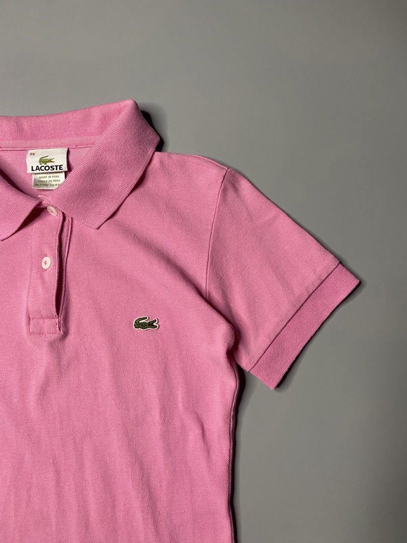 Lacoste Pink Polo Shirt (Category: Blouses) located in Bago City. Submitted by jg_finds_ (Listing ID 1464005639, Image 1). Description: size small (34) on tag Dimensions: Width- 14 inch Length- 22 inch Like new.
