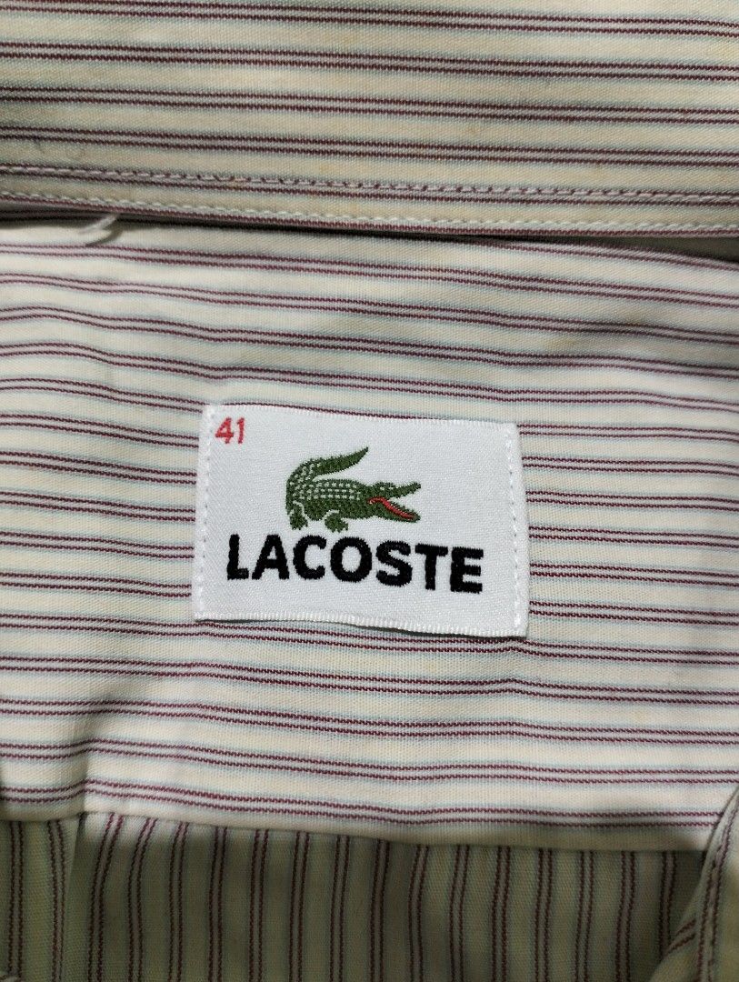Lacoste Striped Long Sleeve Shirt (Category: Longsleeves) located in Taguig. Submitted by conniemdcruz (Listing ID 1464074371, Image 2). Description: - Classic Lacoste long-sleeve shirt - Features thin pinstripes - Button-down collar - Single chest pocket with iconic crocodile logo - Button cuffs - Versatile for casual and smart-casual outfits - Great for everyday wear Large Width 23 Front 30 Back 32 Excellent condition 700.