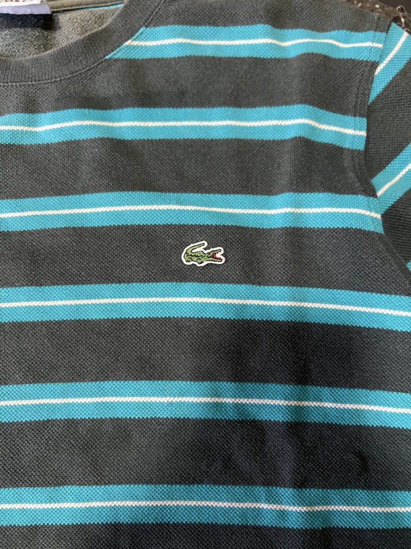 Lacoste Striped Sweatshirt (Category: Coats, Jackets and Outerwear) located in Manila. Submitted by justin_sy (Listing ID 1463982118, Image 2). Description: - Grey and blue striped sweatshirt from Lacoste - Features the classic crocodile logo on the chest - Size: 4 - Ideal for casual wear.
