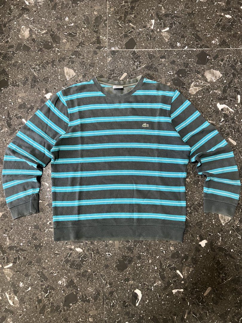 Lacoste Striped Sweatshirt (Category: Coats, Jackets and Outerwear) located in Manila. Submitted by justin_sy (Listing ID 1463982118, Image 1). Description: - Grey and blue striped sweatshirt from Lacoste - Features the classic crocodile logo on the chest - Size: 4 - Ideal for casual wear.