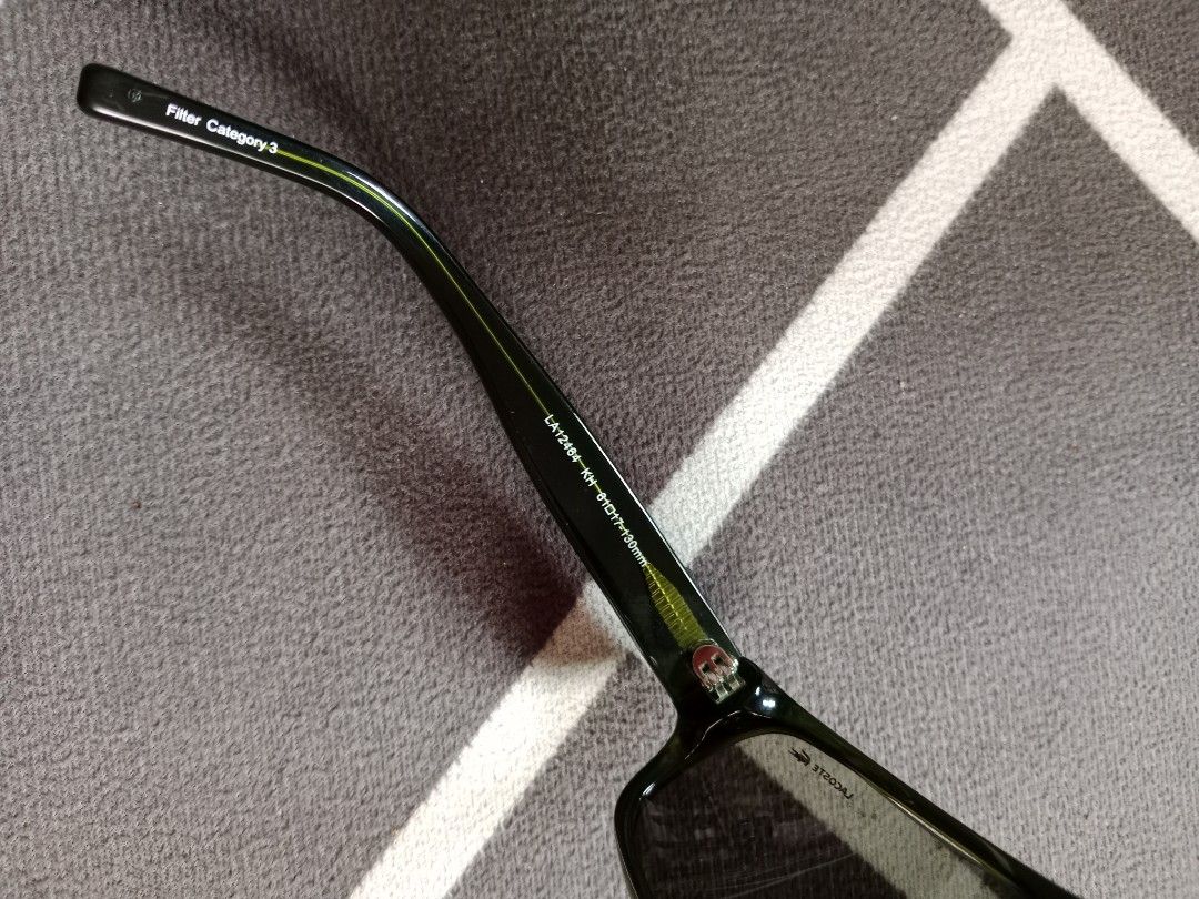 Lacoste Sunglasses LA12464 KH (Category: Sunglasses & Eyewear) located in Baguio. Submitted by jooeeeyyyy_ (Listing ID 1464051611, Image 3). Description: - Dark green Lacoste sunglasses - Model: LA12464 KH - Lens Width: 51mm - Bridge: 17mm - Temple Length: 130mm - Filter Category: 3 - Includes original hard case - Ideal for sunny weather.