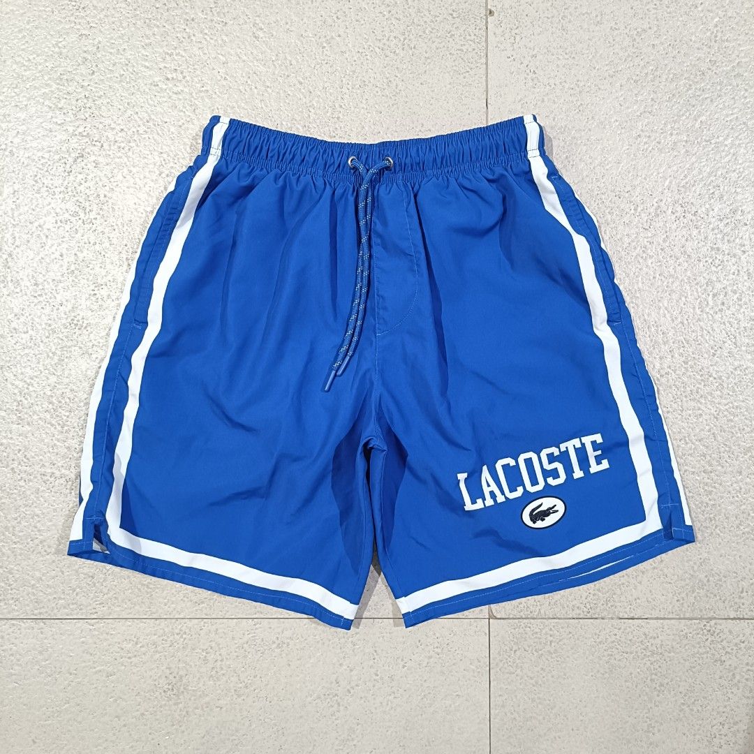 LACOSTE SWIM/TRUNKS SHORT! (Category: Swim Trunks & Board Shorts) located in Cebu City. Submitted by findwaze6000 (Listing ID 1464090156, Image 2). Description: -Excellent to As New -Size: Small on tag -Waistline: 28-34 -Length: 17 -Hem: 11.5 -No issue/Flaw -DM TO PURCHASE 📩.
