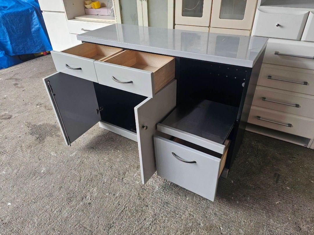 Lateral Kitchen Cabinet (Category: Shelves, Cabinets & Racks) located in Meycauayan. Submitted by marygracecasimiro (Listing ID 1464097225, Image 2). Description: Lateral Kitchen Cabinet ‼️₱8,000‼️ ✔L-39.5 H-27.5 W-14.5 inches 📏 ✔2 Doors,1 Shelf & 4 Drawers 🗄 ✔Laminated 🔖 ✔️Compress and Plywood Back 🪵 ✔Scratches As-is! 👌🩷💙.