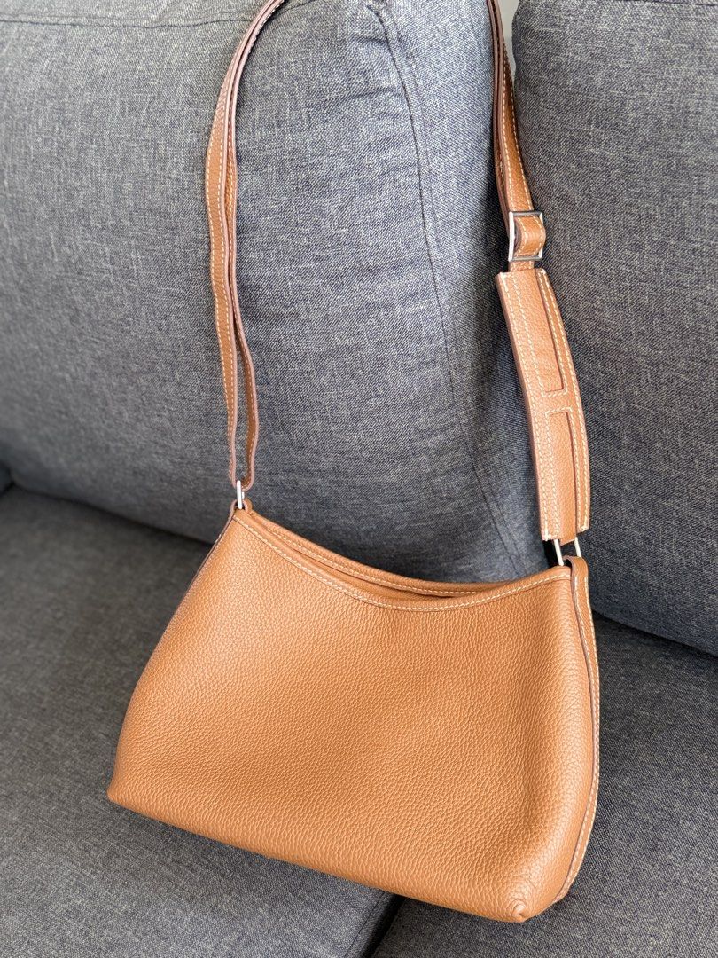 Leather Cognac crossbody bag (Category: Cross-body Bags) located in Quezon City. Submitted by MissusB (Listing ID 1463950116, Image 1). Description: No brand. Very soft leather. Ala hermes .