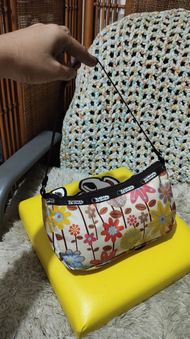 LeSportsac Floral Shoulder Bag (Category: Shoulder Bags) located in Cebu City. Submitted by lumaynojes00490 (Listing ID 1463962274, Image 3). Description: - Cute LeSportsac shoulder bag - Fun floral print - Dark brown strap - Compact size for essentials - Secure zipper closure - Ideal for everyday or casual outings - Adds a pop of color to your outfit.