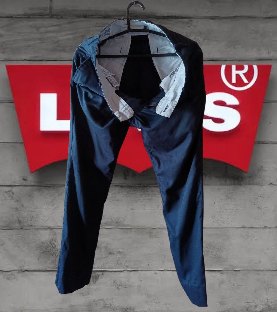 Levi Strauss & Co. Original Riveted Clothing Pants (Category: Jeans) located in Manila. Submitted by brandedfriend (Listing ID 1463966020, Image 1). Description: - Classic Levi Strauss & Co. pants - Original riveted clothing - Dark navy color - Straight leg style - Comfortable fit - Perfect for everyday wear or dressing up - Please check photos for detailed condition.