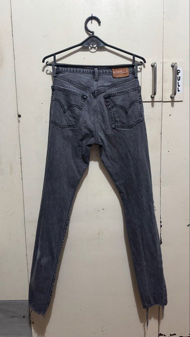 Levi's 501 Grey Distressed Button Fly Jeans W24 L32 (Category: Jeans) located in Bacoor. Submitted by jiricu1 (Listing ID 1464080254, Image 2). Description: - Authentic Grey Levi's 501 Jeans - Button Fly Closure - Distressed Details (Knee & Thigh) - Raw Hem - Size: W24 L32 - Measurements: Waist 61cm, Hips 86cm - Check tag for more details.
