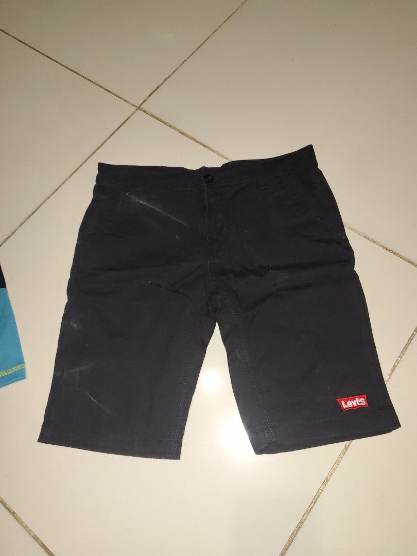 Levi's Black Chino Shorts (Category: Babies & Kids Fashion) located in Manila. Submitted by duffy-080 (Listing ID 1464031539, Image 1). Description: - Classic black Levi's shorts - Comfortable chino style - Perfect for casual wear - Features signature Levi's tab on back pocket - Button and zip front closure - Two side pockets and two back pockets -waist 38 -lenght 47 need wash lang used once.