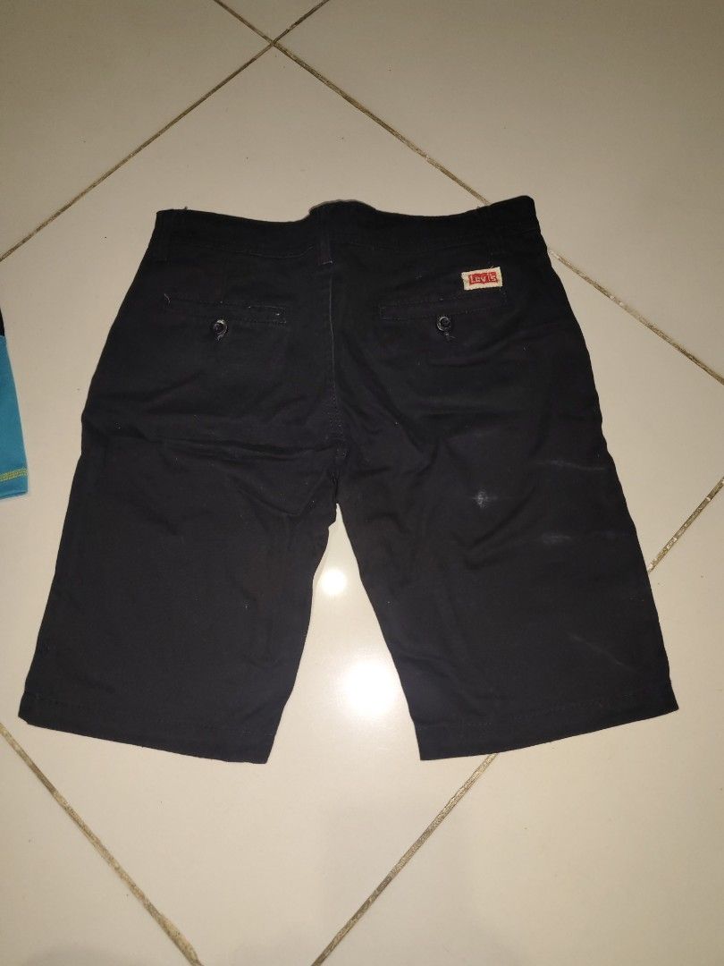 Levi's Black Chino Shorts (Category: Babies & Kids Fashion) located in Manila. Submitted by duffy-080 (Listing ID 1464031539, Image 2). Description: - Classic black Levi's shorts - Comfortable chino style - Perfect for casual wear - Features signature Levi's tab on back pocket - Button and zip front closure - Two side pockets and two back pockets -waist 38 -lenght 47 need wash lang used once.