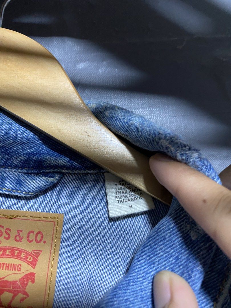 Levi's Denim Jacket - Blue - Size M (Category: Coats, Jackets and Outerwear) located in Antipolo. Submitted by drop.thrifts (Listing ID 1463961889, Image 3). Description: - Classic blue Levi's denim jacket - Made in Thailand - 100% Cotton - Iconic red tab and button closure - Subtle distressed details on fabric - Ideal for layering - Dimes: 20.5x25.5 - 1,200 free shipping .