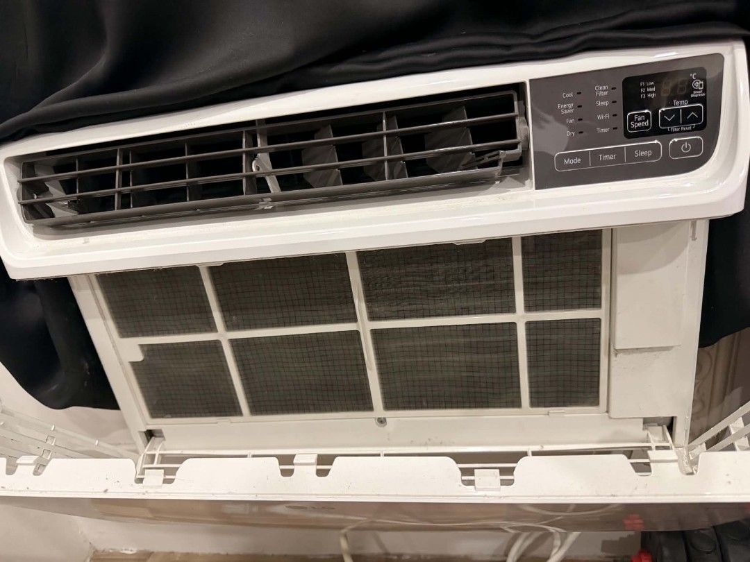 LG ThinQ Dual Inverter Window Air Conditioner (Category: Air Conditioning and Heating) located in Manila. Submitted by wynzonline4 (Listing ID 1464078359, Image 2). Description: - LG Window Air Conditioner - Dual Inverter Technology for efficient cooling - ThinQ Enabled for smart home control - Features a washable filter for easy maintenance - Sleek white design - Perfect for keeping your room cool and comfortable - Unit has been tested and is in