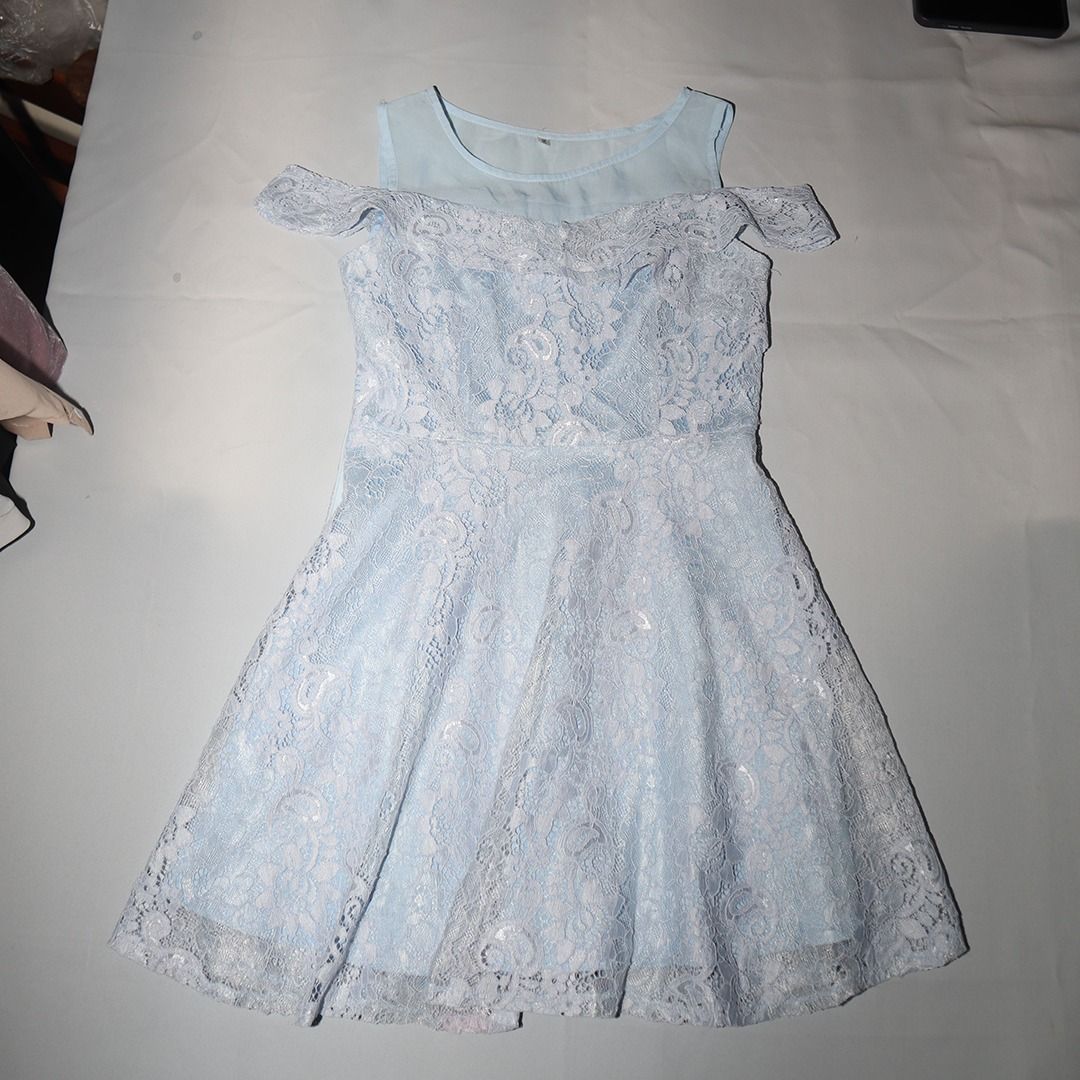 Light Blue Cold Shoulder Lace Dress (Category: Dresses) located in Tanauan. Submitted by arlene_panganiban (Listing ID 1463988256, Image 2). Description: - Light blue dress - Lace overlay - Cold shoulder design - Sheer neckline - Flared skirt - Ideal for parties and events.