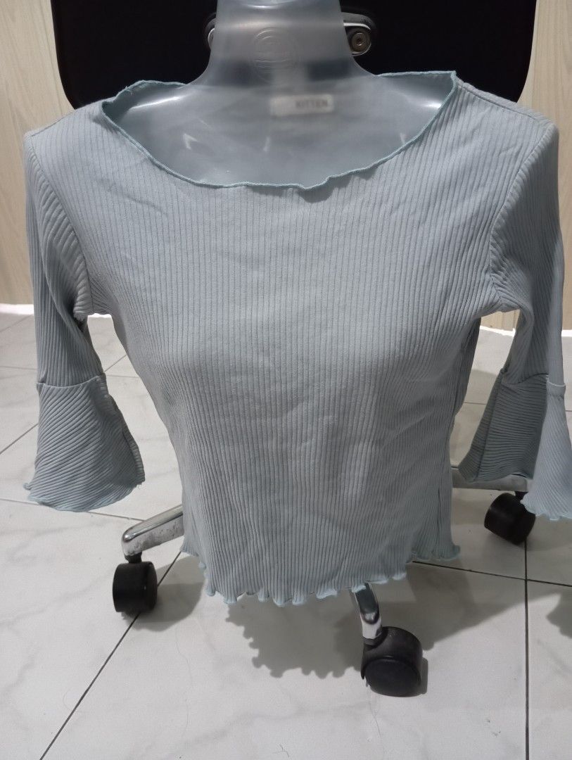 Light Blue Ribbed Bell Sleeve Top (Category: Longsleeves) located in Dasmarinas. Submitted by kei05 (Listing ID 1463958016, Image 1). Description: - Light blue ribbed fabric - Flattering bell sleeves - Adorable lettuce hem on sleeves and neckline - Stretchy and comfortable material - Versatile for casual or dressy occasions.