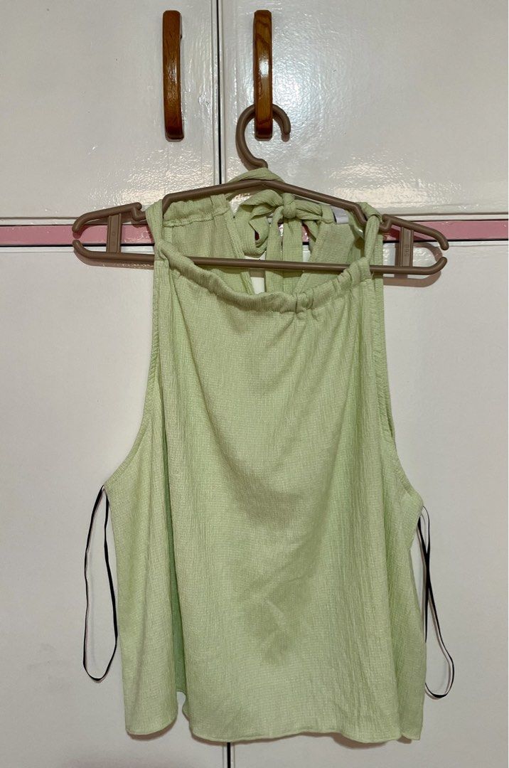 H&M Light Green Halter Neck Top with Tie Back (Category: Sleeveless) located in Marikina City. Submitted by saaaanby (Listing ID 1464024521, Image 1). Description: - H&M Halter neck with tie-back closure - SMALL TO MEDIUM BODY FRAME - USED ONCE - PHP 300 - NO LAST PRICE .