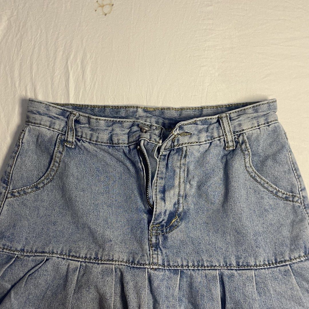 Light Wash Denim Ruffle Skirt y2k alt emo (Category: Skirts) located in Bacolod City. Submitted by stqrshel (Listing ID 1464061124, Image 2). Description: XS-S (but fits better on xs) 40-45 KG with loose threads but not visible. - Light wash denim skirt - Playful ruffled hemline - Front zipper and button closure - Two front pockets - Ideal for casual outings - Easy to style with tops and sneakers.