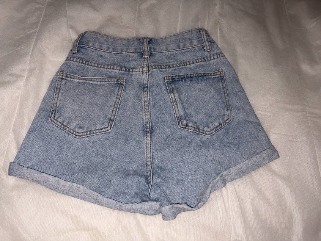 Light Wash High Waisted Denim Shorts (Category: Shorts) located in Dasmarinas. Submitted by thriftcavite (Listing ID 1463941789, Image 2). Description: - Cute light wash denim shorts - High-waisted style - Cuffed hem - Classic five-pocket design - Button and zip closure - Great for casual wear - Easy to pair with any top SIZE 23-25.