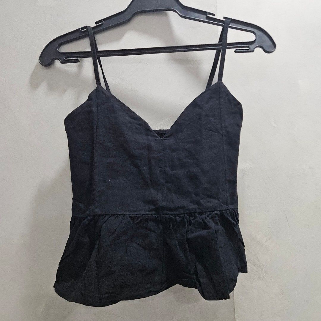Linen semi crop spaghetti strap peplum top (Category: Sleeveless) located in Quezon City. Submitted by k_closetsale (Listing ID 1463945474, Image 3). Description: linen semi crop spaghetti strap peplum style garterized back fits up to 36bust.