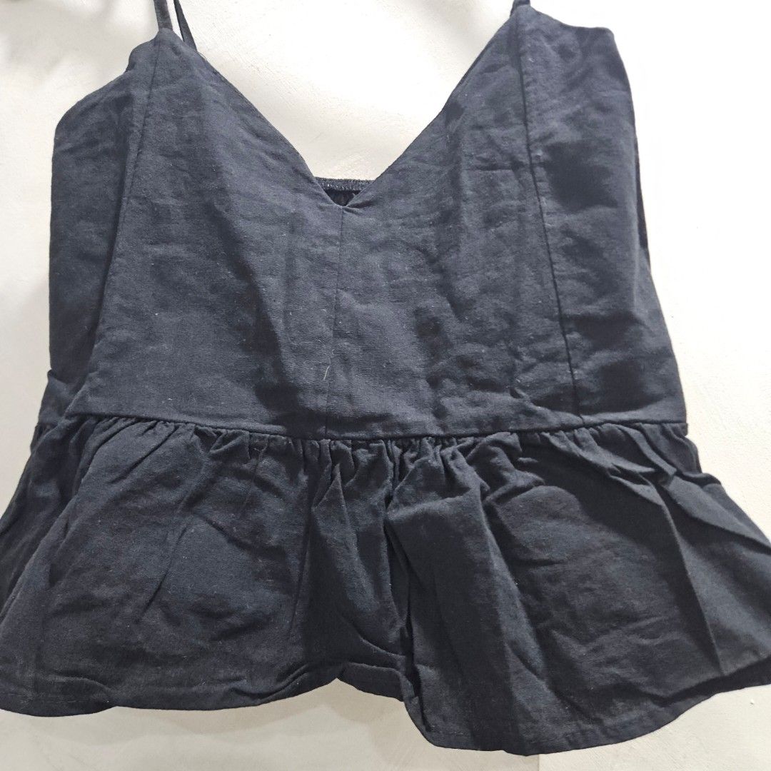 Linen semi crop spaghetti strap peplum top (Category: Sleeveless) located in Quezon City. Submitted by k_closetsale (Listing ID 1463945474, Image 2). Description: linen semi crop spaghetti strap peplum style garterized back fits up to 36bust.
