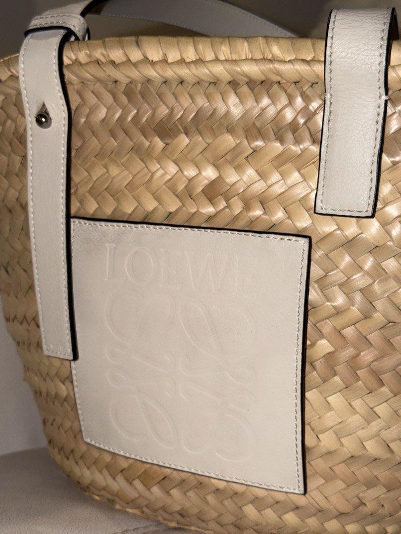 LOEWE BASKET IN MEDIUM (Category: Shoulder Bags) located in Quezon City. Submitted by xxyagirlxx (Listing ID 1463965072, Image 3). Description: - Brand new & Authentic Loewe Basket in Medium - Bought from SSI Event - Rattan - White leather handles and trim - Iconic Loewe anagram embossed on leather patch - Comes with original tags and dust bag RFS: Won’t be able to use this.