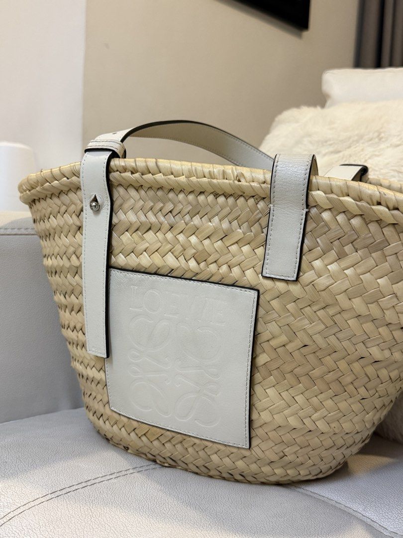 LOEWE BASKET IN MEDIUM (Category: Shoulder Bags) located in Quezon City. Submitted by xxyagirlxx (Listing ID 1463965072, Image 1). Description: - Brand new & Authentic Loewe Basket in Medium - Bought from SSI Event - Rattan - White leather handles and trim - Iconic Loewe anagram embossed on leather patch - Comes with original tags and dust bag RFS: Won’t be able to use this.