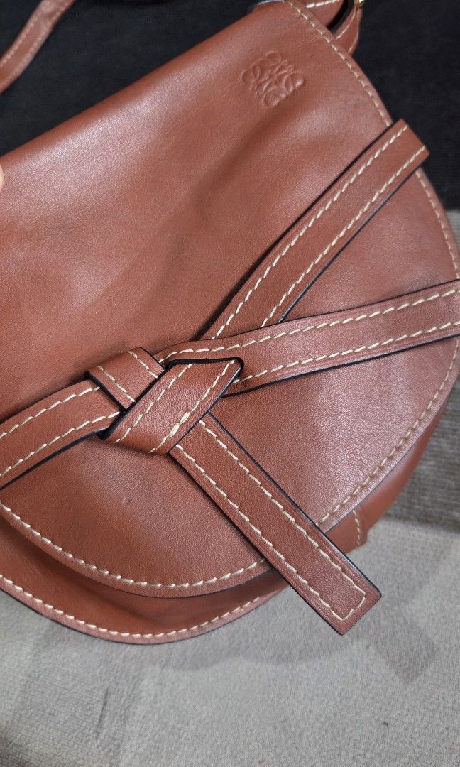 Loewe Gate 2018 Bag (Category: Luxury Bags & Wallets) located in Pagudpud. Submitted by jmpascual044757 (Listing ID 1464000862, Image 3). Description: self authenticated, i believe it is! but again ill have to atleast say: au.th.en.c.ty is not guaranteed since i dont have any documents and paper inclusions. in great condition light sign of usage personal preloved kept for almost 5 years now * flaw: i have changed 1 gromet already no rubs or holes