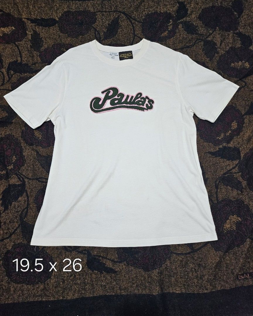 Loewe x Paula’s Ibiza "Paula's" Script Patch T-Shirt (Category: Luxury Apparel) located in Candelaria. Submitted by bentablesetc (Listing ID 1463981472, Image 1). Description: Loewe x Paula’s Ibiza "Paula's" Script Patch T-Shirt Medium on tag 19.5 x 26 600 + sf Loc: Candelaria Quezon.