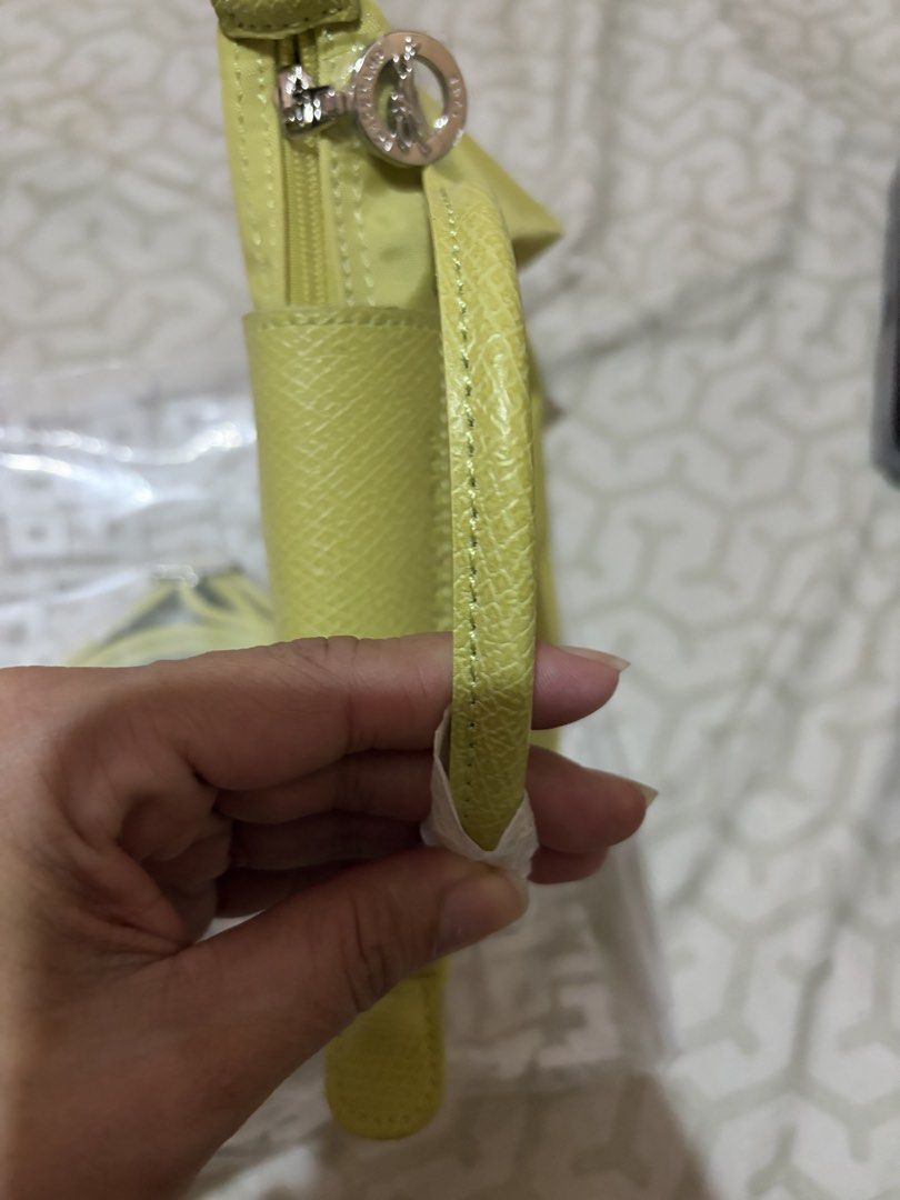 Longchamp le pliage one mini (Category: Luxury Bags & Wallets) located in Taguig. Submitted by dean_cute25 (Listing ID 1464009755, Image 3). Description: 💯 original money back guarnteed if fake complete inclusion can fit iphone promax very spacious lime color.