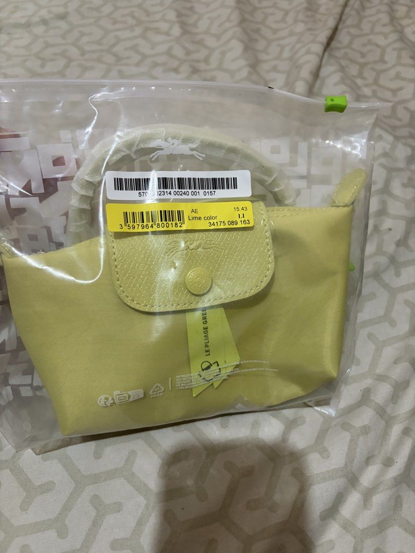 Longchamp le pliage one mini (Category: Luxury Bags & Wallets) located in Taguig. Submitted by dean_cute25 (Listing ID 1464009755, Image 2). Description: 💯 original money back guarnteed if fake complete inclusion can fit iphone promax very spacious lime color.