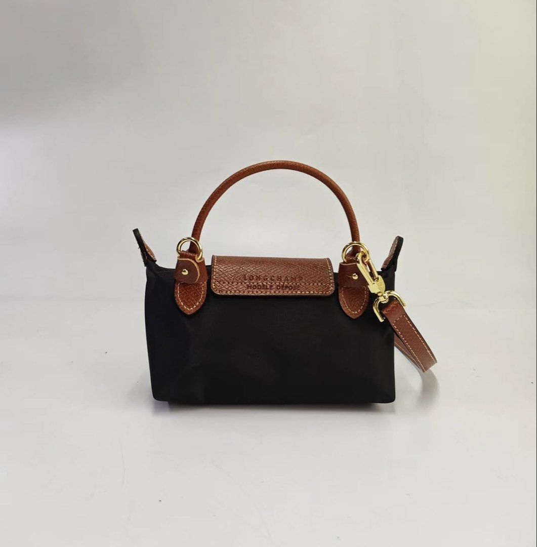 Longchamp Mini Sling - Black (Category: Cross-body Bags) located in Quezon City. Submitted by asrcollections (Listing ID 1464129534, Image 3). Description: Longchamp Mini Sling Black Onhand and ready to ship 💌chat me po for More colors available 📍Quezon City.