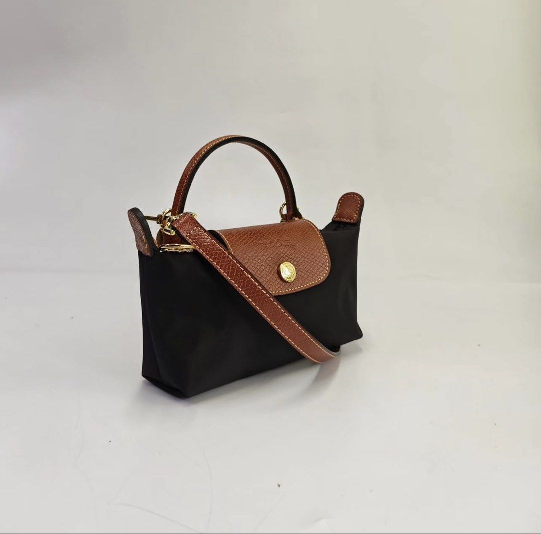 Longchamp Mini Sling - Black (Category: Cross-body Bags) located in Quezon City. Submitted by asrcollections (Listing ID 1464129534, Image 2). Description: Longchamp Mini Sling Black Onhand and ready to ship 💌chat me po for More colors available 📍Quezon City.