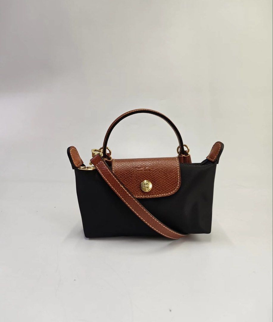 Longchamp Mini Sling - Black (Category: Cross-body Bags) located in Quezon City. Submitted by asrcollections (Listing ID 1464129534, Image 1). Description: Longchamp Mini Sling Black Onhand and ready to ship 💌chat me po for More colors available 📍Quezon City.