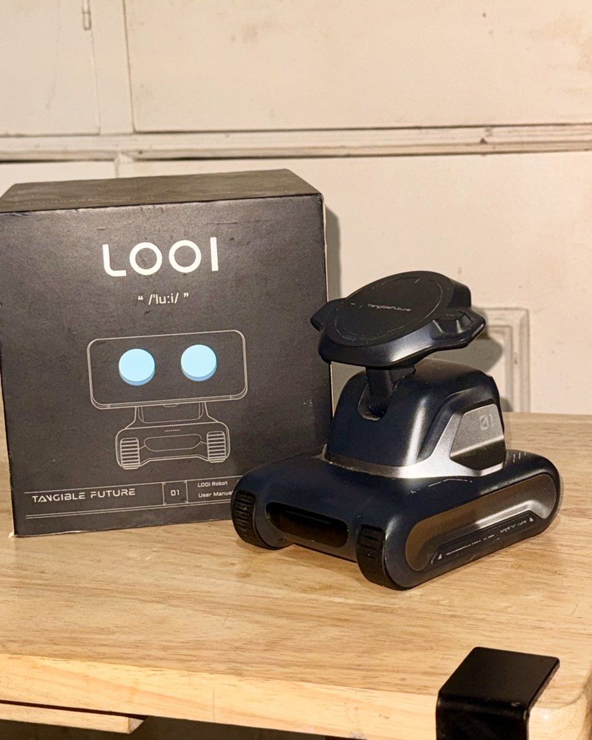 LOOI Live Agent AI Desktop Companion Robot (Category: Designer & Blind Box Toys) located in Manila. Submitted by gf1991 (Listing ID 1464056158, Image 1). Description: - LOOI Live Agent AI Robot - Omni-modal, end-to-end AI desktop companion - Features character-level behavior engine for coherent interactions - Latest app version: v2.9.0 - Includes original box and USB-C to USB chord RFS: Need cash .