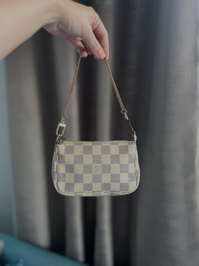 Louis Vuitton Damier Azur Mini Pochette (Category: Luxury Bags & Wallets) located in Manila. Submitted by iluvc4ts_ (Listing ID 1464052519, Image 1). Description: Louis Vuitton Damier Azur Mini Pochette 🔥 ₱25,500 / $408 Negotiable!! Can do meet up sa malapit, South Caloocan Loc / Makati Area. Mode of Shipping: J&t, Lalamove, or Lbc para sa mga malalayo. Shipping fee is shouldered by the buyer. Thaankyouuu!! ❤️ We offer 100% authentic items. All 