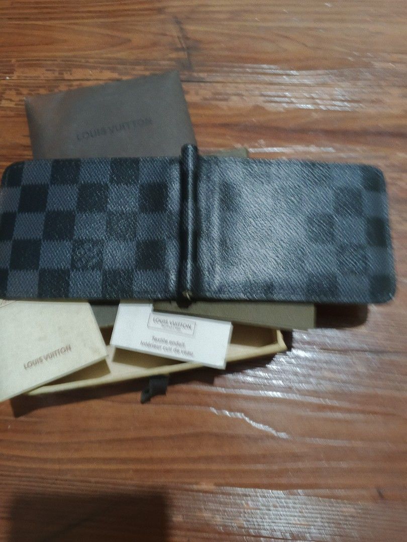 Louis Vuitton Damier Graphite Money Clip Wallet (Category: Wallets & Card Holders) located in Quezon City. Submitted by melsa45 (Listing ID 1464113111, Image 2). Description: - Authentic Louis Vuitton Money Clip Wallet - Classic Damier Graphite Canvas - Includes Original Box and Dust Bag - Minor signs of wear on interior card slots - Plenty of life remaining, a stylish essential.