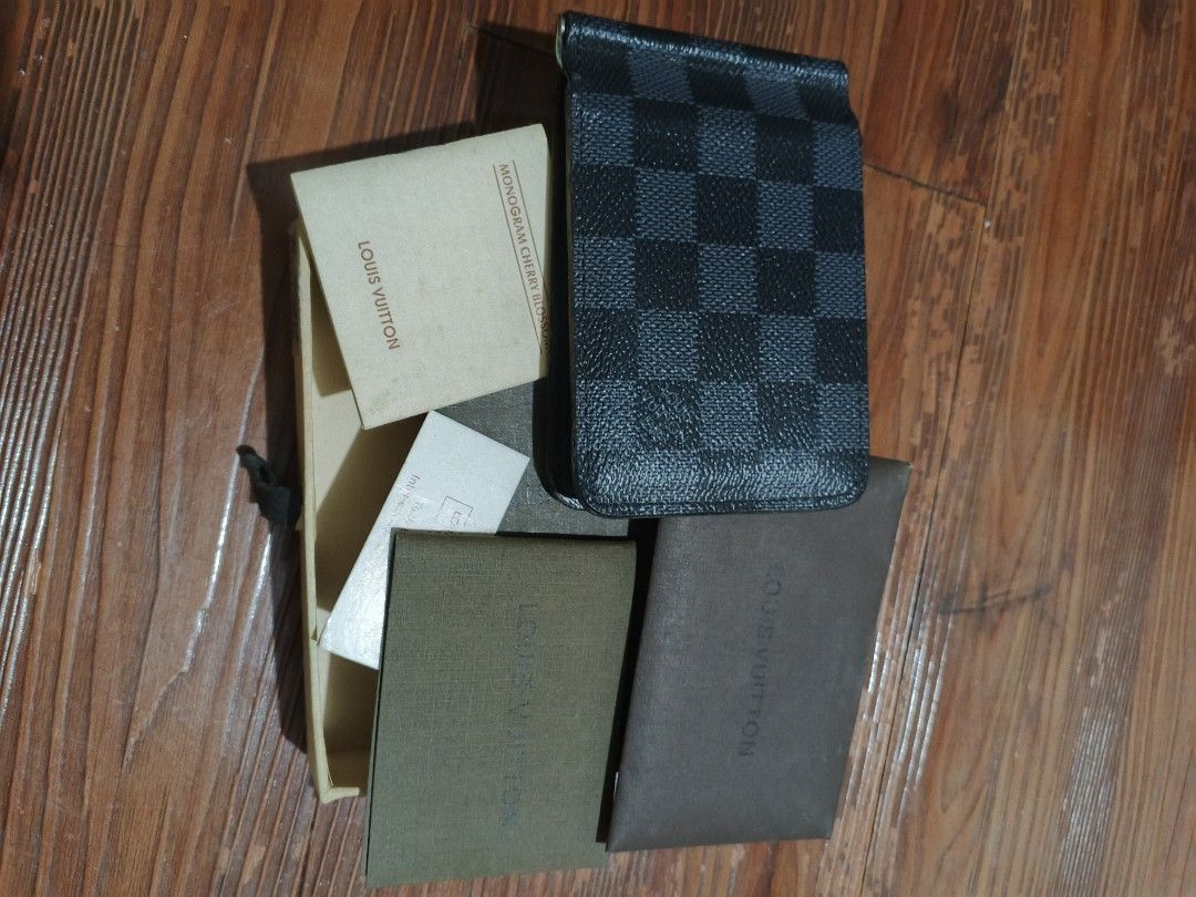 Louis Vuitton Damier Graphite Money Clip Wallet (Category: Wallets & Card Holders) located in Quezon City. Submitted by melsa45 (Listing ID 1464113111, Image 1). Description: - Authentic Louis Vuitton Money Clip Wallet - Classic Damier Graphite Canvas - Includes Original Box and Dust Bag - Minor signs of wear on interior card slots - Plenty of life remaining, a stylish essential.
