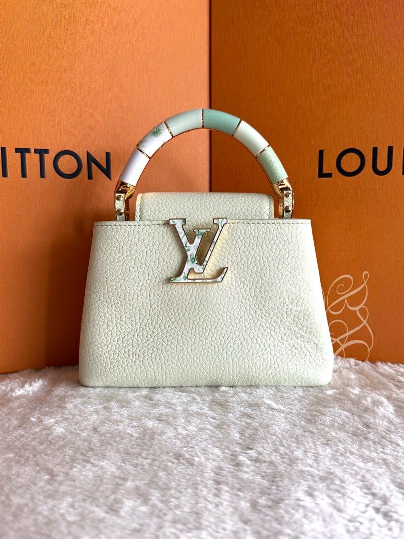 Louis Vuitton Mini Capucines Gold Hardware Kintsugi in Vert D'eau Taurillon Leather (Category: Luxury Bags & Wallets) located in Paranaque City. Submitted by belles_lux_closet (Listing ID 1464072337, Image 2). Description: AUTHENTIC MINI CAPUCINES GOLD HARDWARE KINGSUGI IN VERT D’EAU TAURILLON LEATHER (Microchipped & Mint Condition) ✅ 100% Guaranteed Authentic ✅ Microchipped ✅ Mint Condition, Rank A-SA ✅ Comes with long adjustable leather strap a