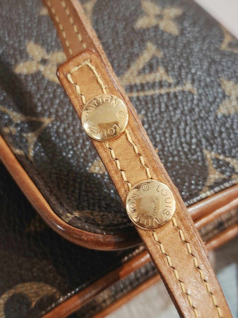 Louis Vuitton Monogram Twin Pochette (Category: Luxury Bags & Wallets) located in Manila. Submitted by ms.conv (Listing ID 1463979665, Image 3). Description: - Classic Louis Vuitton monogram wallet - Color: Brown canvas with tan leather trim - Closure: Snap - Includes: Dust bag - Ideal for carrying essentials.