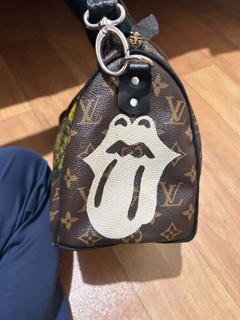 Louis Vuitton Speedy Monogram Bee Rolling Stones Custom Bag (Category: Luxury Bags & Wallets) located in Valenzuela. Submitted by jmateo52697 (Listing ID 1464067288, Image 3). Description: - Customized Louis Vuitton Speedy Bag - Features unique bee graphic on front - Rolling Stones lips graphic on side - Classic monogram canvas - Black velvet handle covers - Includes detachable shoulder strap - Date code: SP2007 - Perfect for collectors and fashi