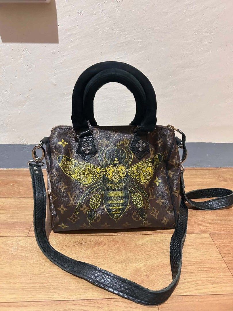 Louis Vuitton Speedy Monogram Bee Rolling Stones Custom Bag (Category: Luxury Bags & Wallets) located in Valenzuela. Submitted by jmateo52697 (Listing ID 1464067288, Image 1). Description: - Customized Louis Vuitton Speedy Bag - Features unique bee graphic on front - Rolling Stones lips graphic on side - Classic monogram canvas - Black velvet handle covers - Includes detachable shoulder strap - Date code: SP2007 - Perfect for collectors and fashi