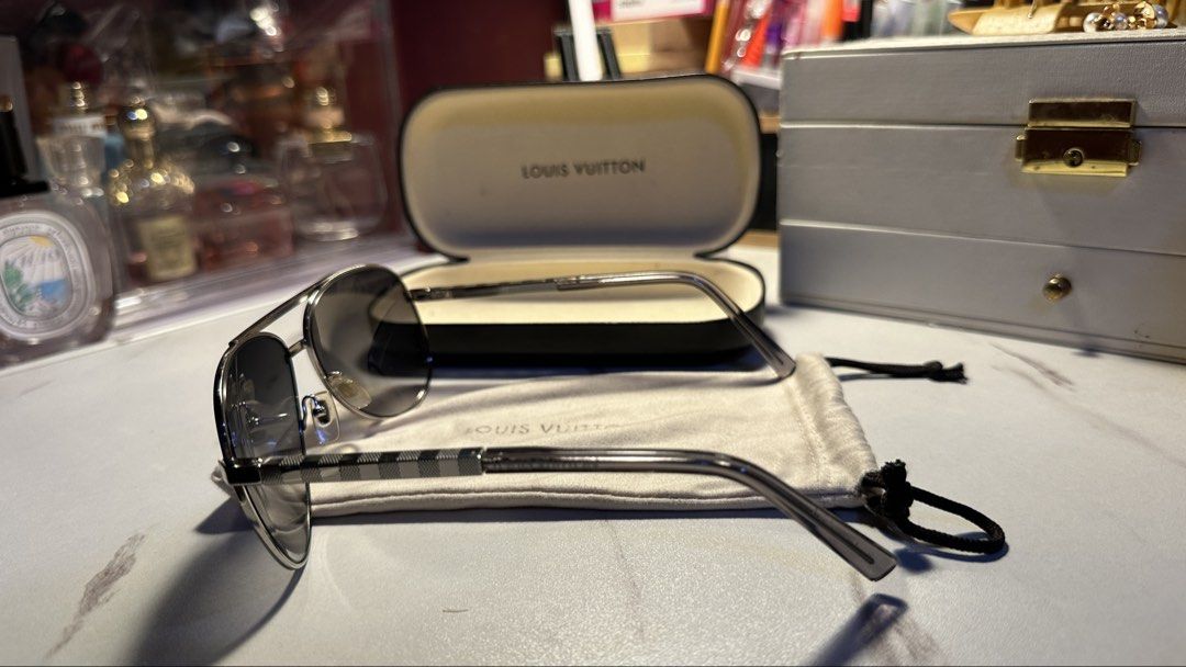Louis Vuitton VINTAGE Aviator Sunglasses (Category: Sunglasses & Eyewear) located in Manila. Submitted by traversing_life (Listing ID 1463954476, Image 3). Description: - Authentic Louis Vuitton Aviator Sunglasses - Frame Color: Silver - Lens Type: Gradient Lenses - Includes Original Case and Dust Pouch - Versatile for everyday or special occasions - Vintage - From japan - negiotable price.