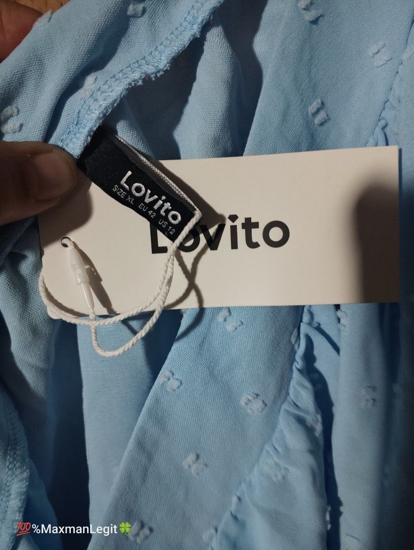 Lovito One Shoulder Tie Top Blue (Category: Sleeveless) located in Quezon City. Submitted by sellingwithlove2018 (Listing ID 1464031148, Image 3). Description: - Lovito blue one-shoulder top - Features a cute tie detail on the shoulder - Textured fabric with a subtle small dot pattern - Versatile for casual day or night out - Easily pairs with shorts or jeans.