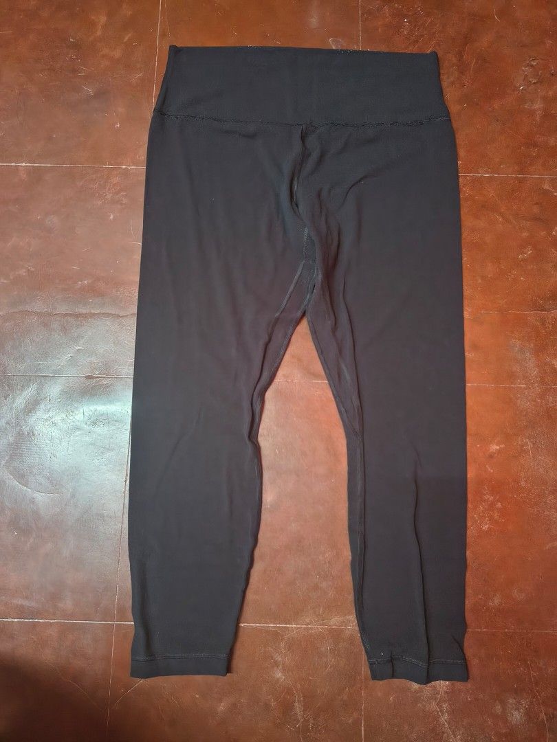 Lululemon Black High-Waisted Leggings (Category: Activewear) located in Bani. Submitted by ger.0 (Listing ID 1463951625, Image 1). Description: - Brand: Lululemon - Color: Black -size: (waist- 13.5 inch; length- 35 inch - Style: High-waisted, cropped length - Comfort: Perfect for workouts or lounging - Condition: Shows some signs of wear (especially ankles), but plenty of life remaining - Versatility: Great for everyday wear.