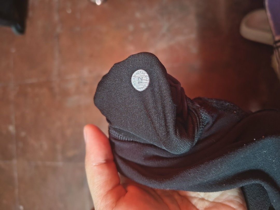 Lululemon Black High-Waisted Leggings (Category: Activewear) located in Bani. Submitted by ger.0 (Listing ID 1463951625, Image 3). Description: - Brand: Lululemon - Color: Black -size: (waist- 13.5 inch; length- 35 inch - Style: High-waisted, cropped length - Comfort: Perfect for workouts or lounging - Condition: Shows some signs of wear (especially ankles), but plenty of life remaining - Versatility: Great for everyday wear.