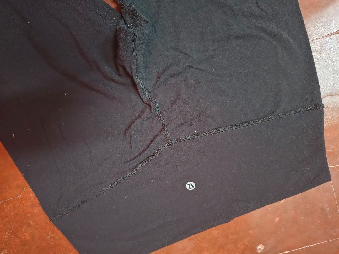 Lululemon Black High-Waisted Leggings (Category: Activewear) located in Bani. Submitted by ger.0 (Listing ID 1463951625, Image 2). Description: - Brand: Lululemon - Color: Black -size: (waist- 13.5 inch; length- 35 inch - Style: High-waisted, cropped length - Comfort: Perfect for workouts or lounging - Condition: Shows some signs of wear (especially ankles), but plenty of life remaining - Versatility: Great for everyday wear.