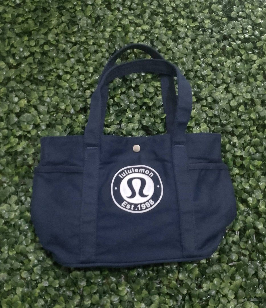 Lululemon Canvas Mini Tote Bag (Category: Tote Bags) located in Davao. Submitted by thrifttayo (Listing ID 1463994817, Image 2). Description: Multi Pocket No Issue ASNEW Condition .