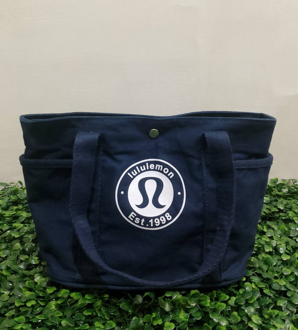 Lululemon Canvas Mini Tote Bag (Category: Tote Bags) located in Davao. Submitted by thrifttayo (Listing ID 1463994817, Image 1). Description: Multi Pocket No Issue ASNEW Condition .