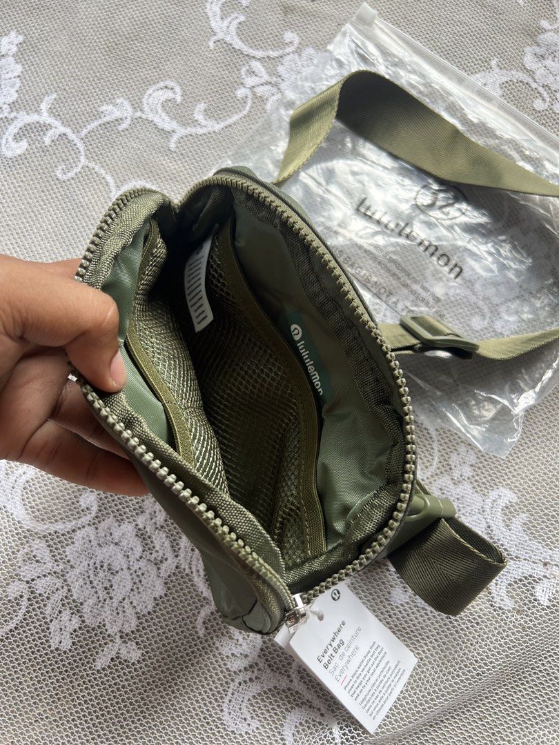 Lululemon Everywhere Belt Bag/ Army Green✅ (Category: Belt bags, Clutches and Pouches) located in Manila. Submitted by trustedmichael. (Listing ID 1464074648, Image 3). Description: ✅From Garage sale ✅Brand New Condition ✅Never Been used ✅With plastic bags ✅Can do Vc for item checking/ Assurance - Brand new Lululemon Everywhere Belt Bag - Color: Army Green💚 - Still in original packaging with tags attached - Features a main zippered compartment -