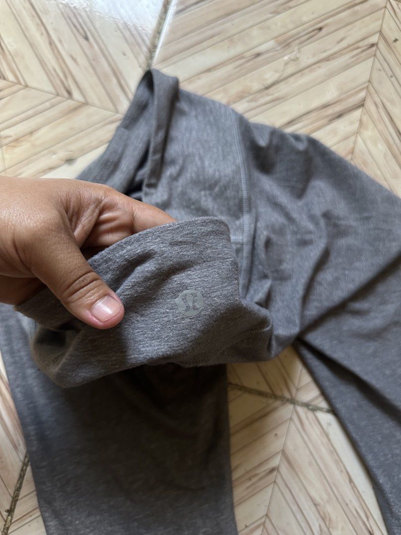Lululemon Grey Leggings Size 6 (Category: Activewear) located in Angeles City. Submitted by alejeong27 (Listing ID 1463968878, Image 3). Description: - Grey Lululemon Leggings - High-Waisted Style - Comfortable for Workouts or Lounging - Size 6 - Lululemon Logo on Waistband and Leg Cuff - Ideal for Everyday Wear.